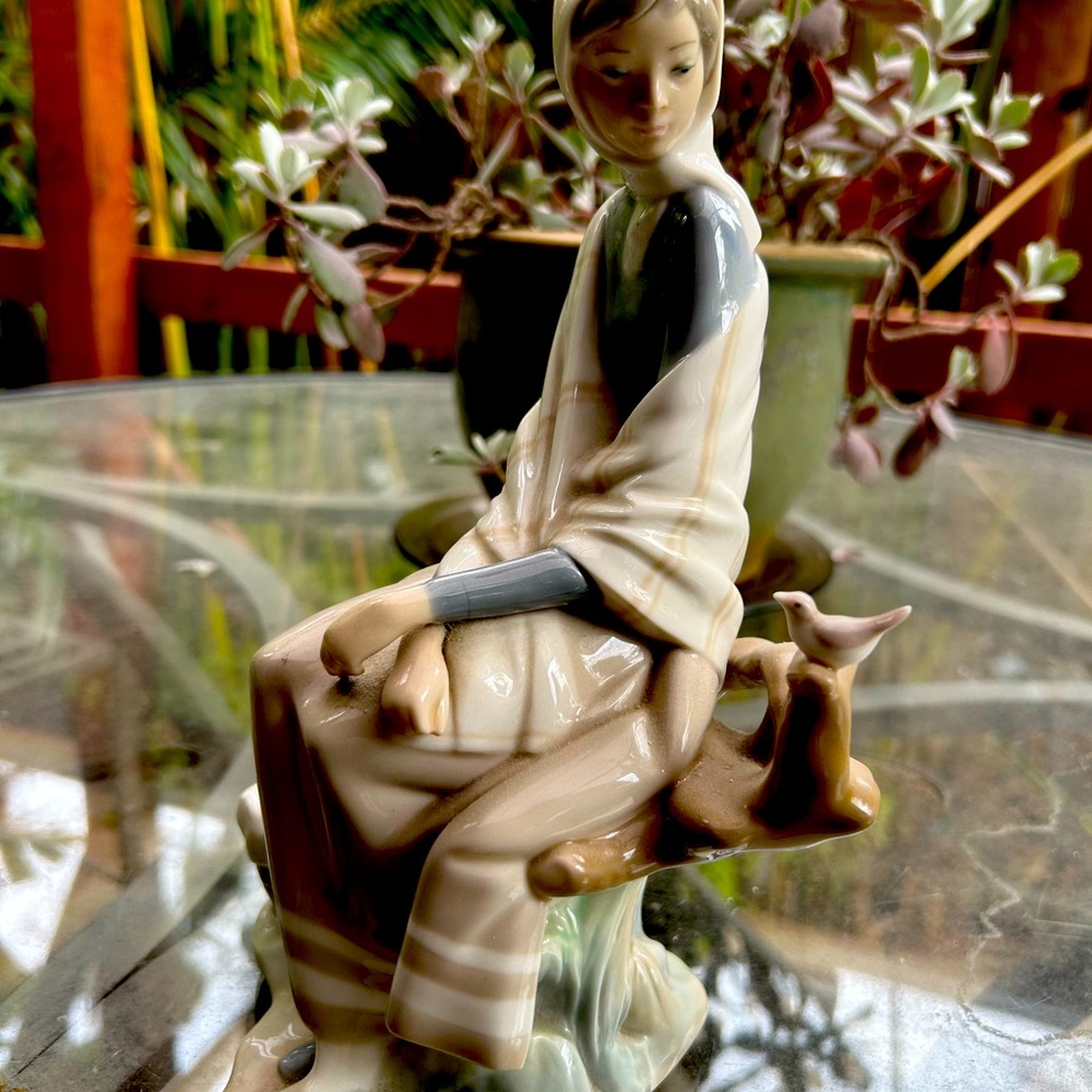 Lladro porcelain figurine “girl on branch with bird” Beautiful glossy finish!
